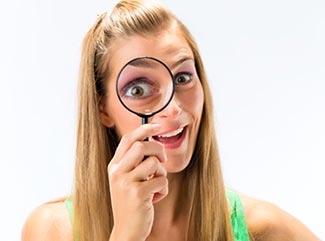 Blond lady with Magnifier