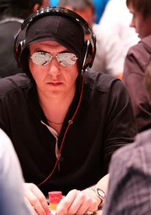 Guy with pokerface wearing sunglasses